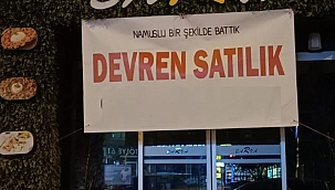 Esnaftan Namuslu bir şekilde battık pankartı...