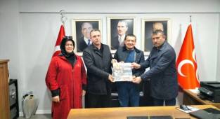 MHP İLÇE TEŞKİLATINA ALMANAK ZİYARETİ