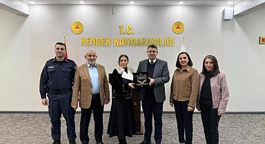 DOÇ. DR. CANAN SOLA ÖZGÜÇ VE EKİBİ KAYMAKAM GÖKPINAR'I ZİYARET ETTİ